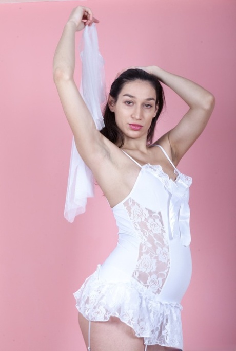 Brunette bride Janetta shows her new hubby exactly where she wants his cock