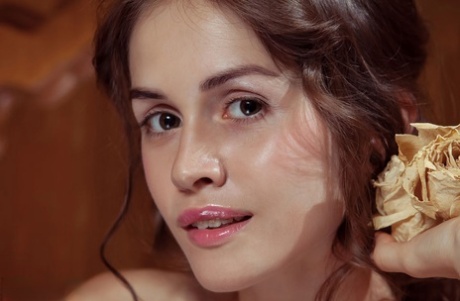 Petite teen girl uncovers her tiny tits as she removes her lingerie and undies