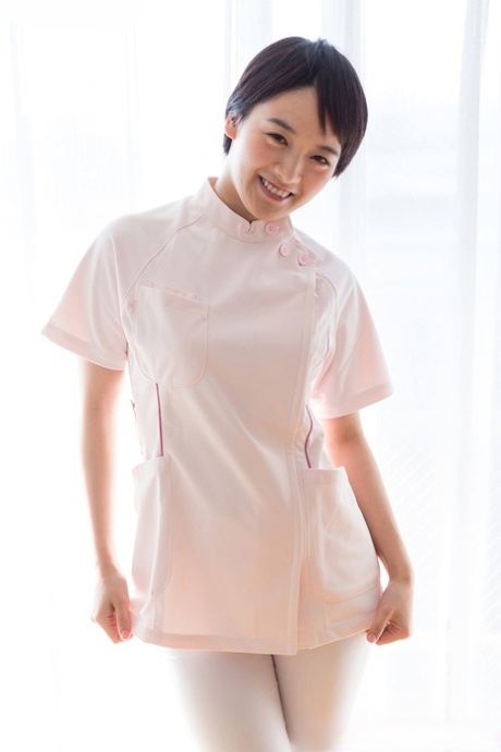 Short haired Japanese teen spits a mouthful of cum into hand after a blowjob
