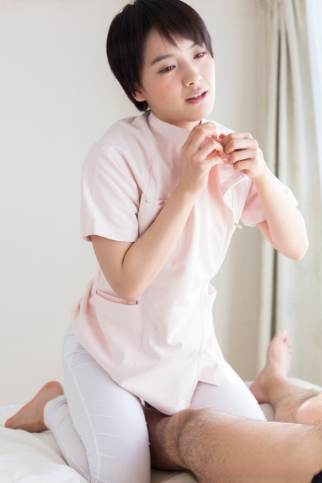 Short haired Japanese teen spits a mouthful of cum into hand after a blowjob