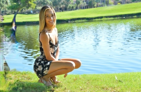 Fresh face Averie showing pantiless upskirt by the lake and fisting pussy