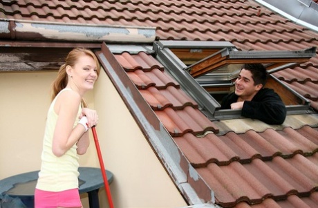 Natural redhead sweeps a patio clean before riding a cock on a bed