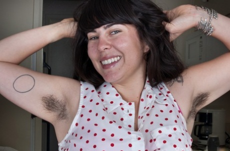 Chubby brunette teen shows off her bush after stripping naked