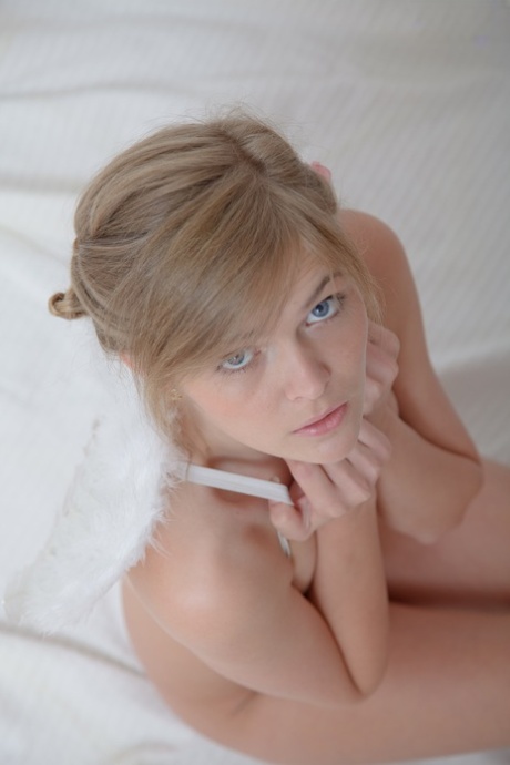 Angelic teen Sofi finger spreads her tight pussy during solo action