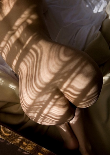 Hot Japanese teen Minor strikes great poses while modelling mostly naked
