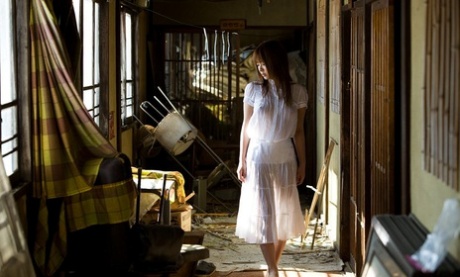 Hot Japanese teen Minor strikes great poses while modelling mostly naked