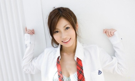 Cute Japanese schoolgirl Risa Chigasaki bares her bush while getting changed