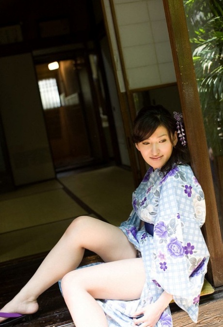Young Japanese girl Ruru exposes her big naturals before flashing her panties