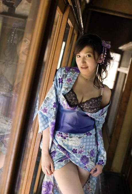 Young Japanese girl Ruru exposes her big naturals before flashing her panties