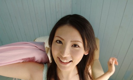 Young Japanese girl Takako Kitahara removes lace panties before posing nude