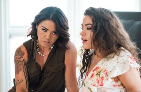 Dana Vespoli and her stepdaughter Victoria Voxxx have lesbian sex on a bed