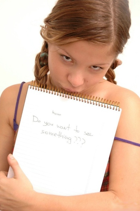 18-year-old cutie exposes her tiny tits during upskirt adventures