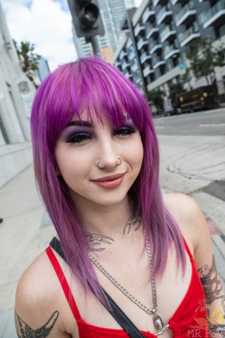Tattooed girl with dyed hair gets banged during a bout of POV fucking