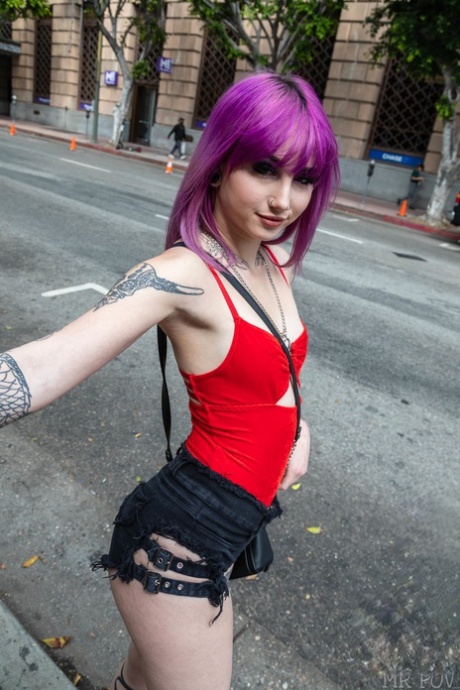 Tattooed girl with dyed hair gets banged during a bout of POV fucking
