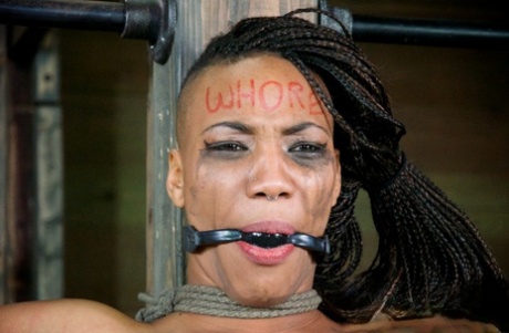 Teen pain sluts are kept in a cage until time for extreme bondage session