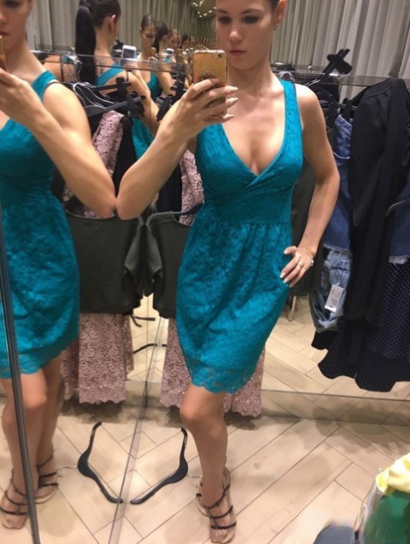 Amateur model Lovenia Lux takes clothed and topless selfies