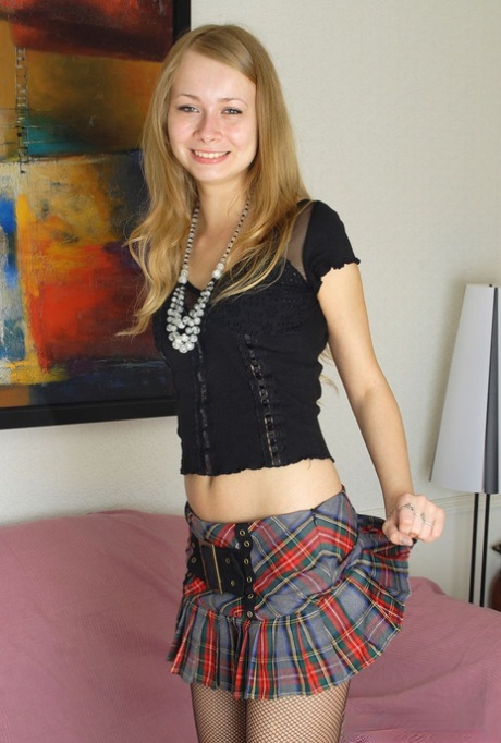 18 year old girl June sticks a double ended dildo in her vagina