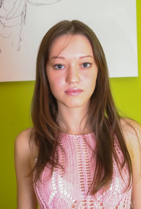 Skinny 18-year-old Alexandra C gets completely naked on a chair