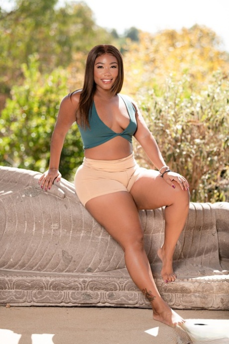 Sabina Rouge and Chanell Heart take turns modelling summer attire outdoors