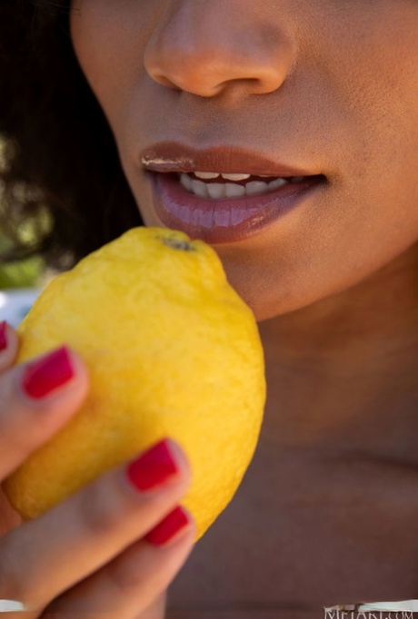 Ebony teen Fatima discards sheer lingerie to get naked on a sunny patio