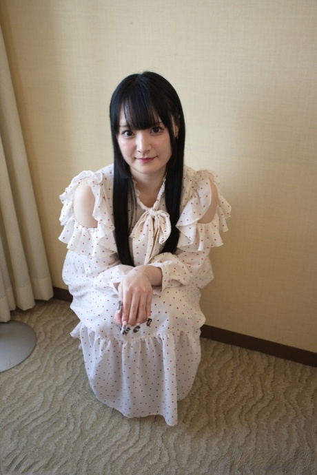 Adorable Japanese teen Reika Kato strips to her bra and panty set
