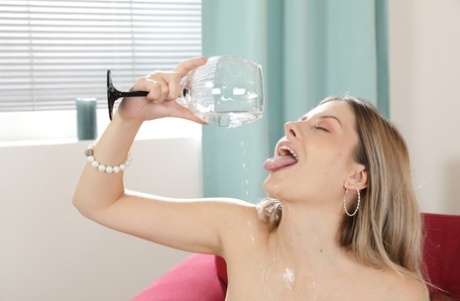 Sweet blonde teen Rebecca Volpetti consumes her own piss during solo play