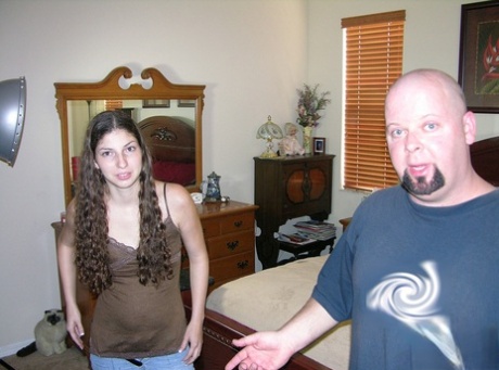Teen first timer swaps oral sex with a bald guy before they fuck on a bed