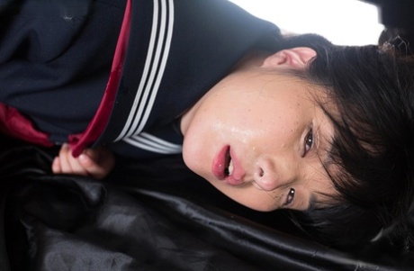 Young Japanese schoolgirl masturbates while giving oral sex