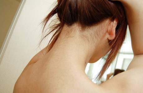 Smiley asian teen Nozomi Takeshita taking shower and exposing her hairy cooter