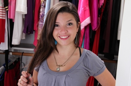 Sweet teenage amateur undressing and spreading her legs in changing room