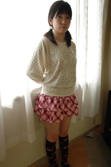 Shy asian teen stripping down and showcasing her gash in close up