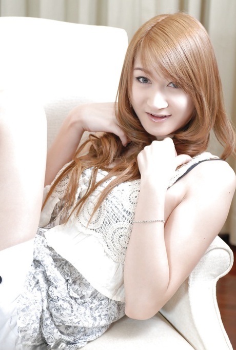 Cute Thai shemale Pond 2 jacks off shedick in Playboy Bunny uniform