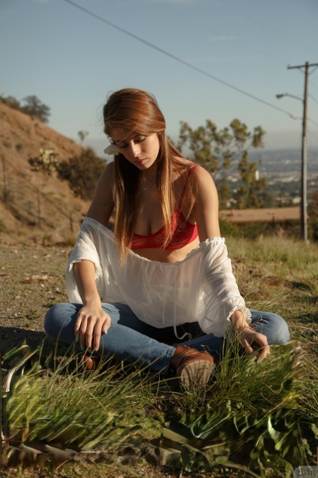 Alluring teen in jeans Gracie Thibble flashes her juicy natural tits outdoors