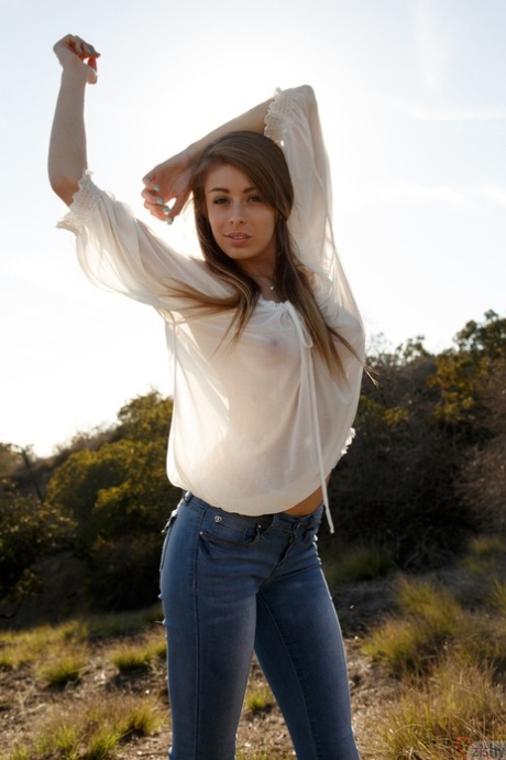Alluring teen in jeans Gracie Thibble flashes her juicy natural tits outdoors