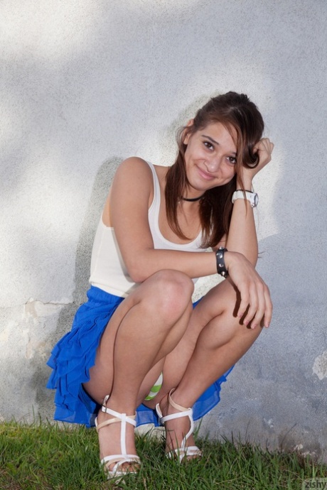 Stunning Latina teen Sara Luvv flashing her green panties in public