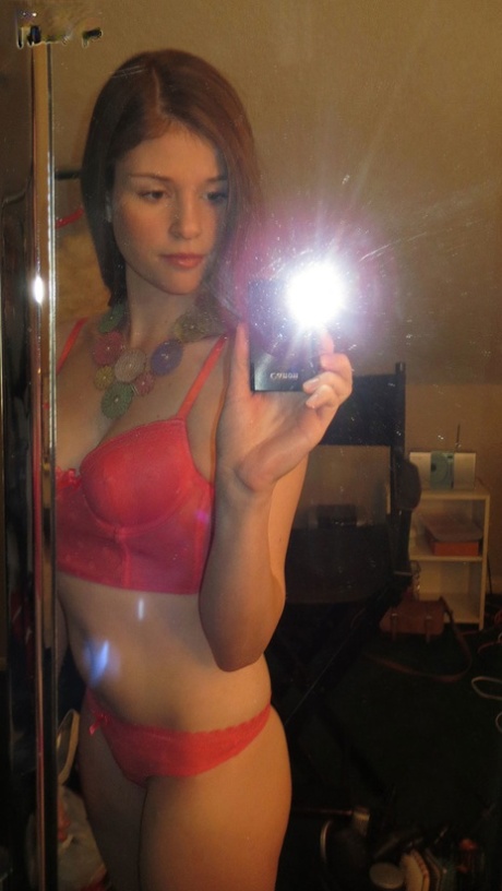 Hot young Lara Brookes peels her sexy teen cloths to show of her luscious tits