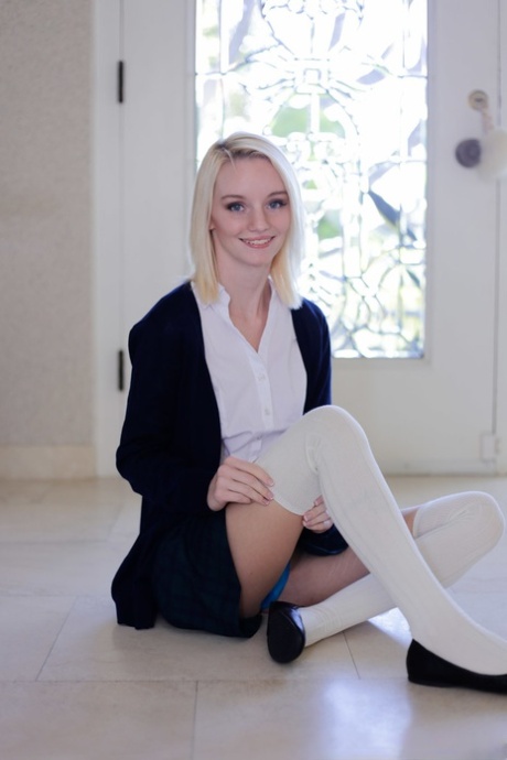 Delicious blonde Sammie Daniels strips to her socks and plays piano