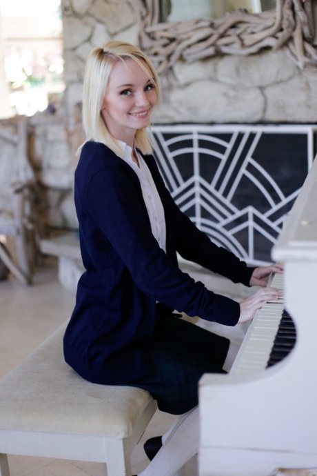 Delicious blonde Sammie Daniels strips to her socks and plays piano