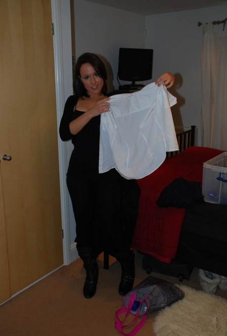 Naughty brunette with ponytails Lucy takes her school uniform for us