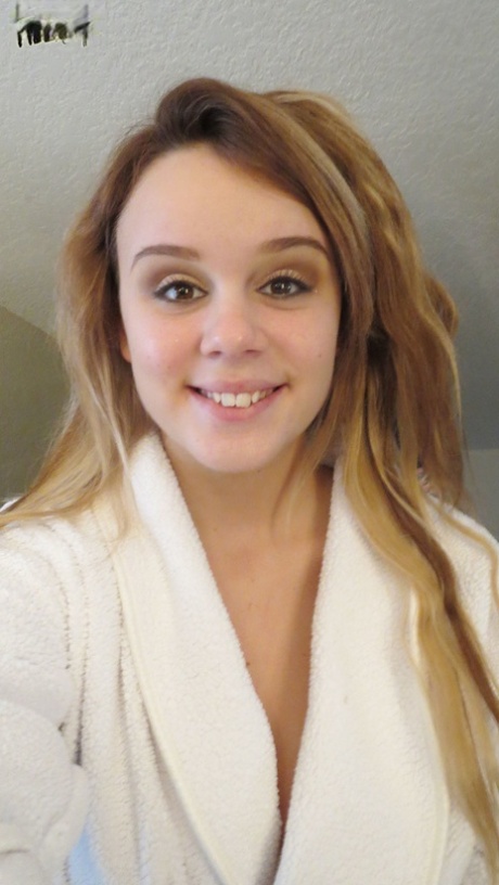 Gorgeous young brunette model Alexis Adams flashes big natural tits in robe