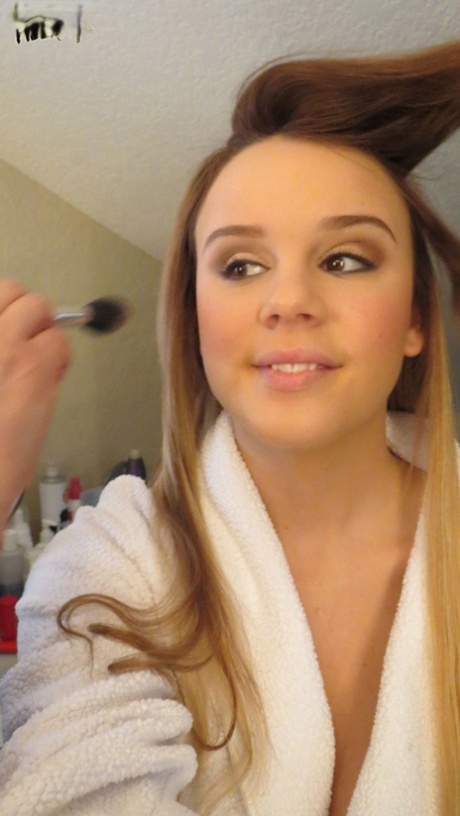 Gorgeous young brunette model Alexis Adams flashes big natural tits in robe