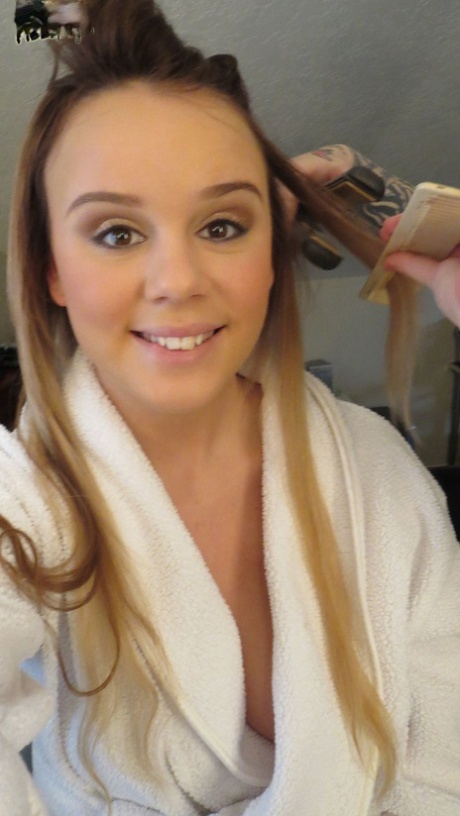 Gorgeous young brunette model Alexis Adams flashes big natural tits in robe