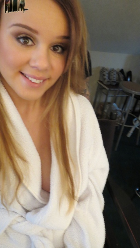Gorgeous young brunette model Alexis Adams flashes big natural tits in robe