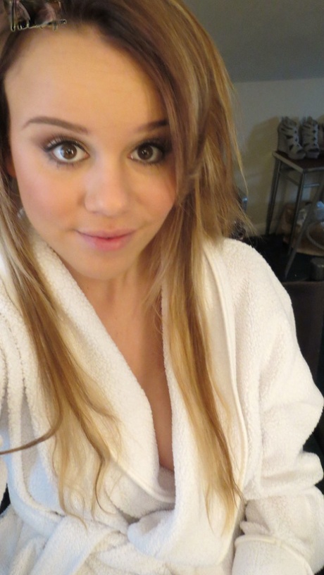 Gorgeous young brunette model Alexis Adams flashes big natural tits in robe