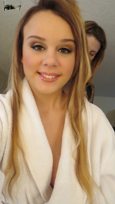 Gorgeous young brunette model Alexis Adams flashes big natural tits in robe