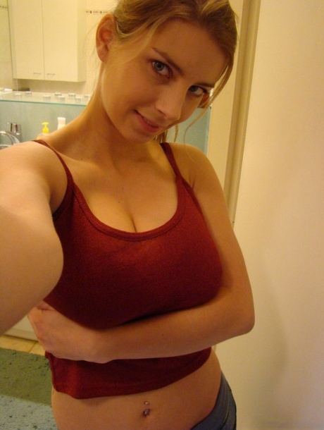 Young busty blonde Kathy displaying her large boobs & her great ass