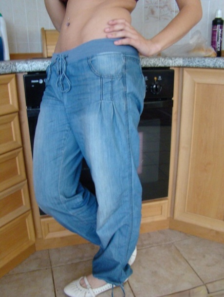 Young busty blonde Kathy displaying her large boobs & her great ass