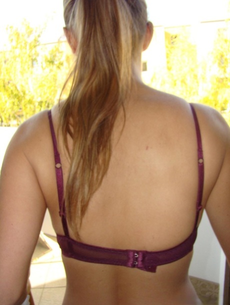 Young busty blonde Kathy displaying her large boobs & her great ass