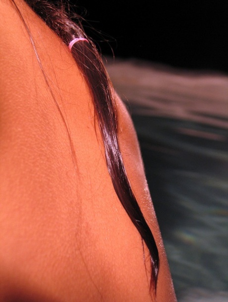 Adorable teen Eva shows her amazing big tits and big ass in a cave pool