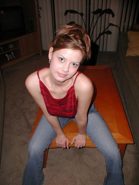 Redhead teen Kelly flaunts sexy feet & sheds jeans to show natural hairy bush